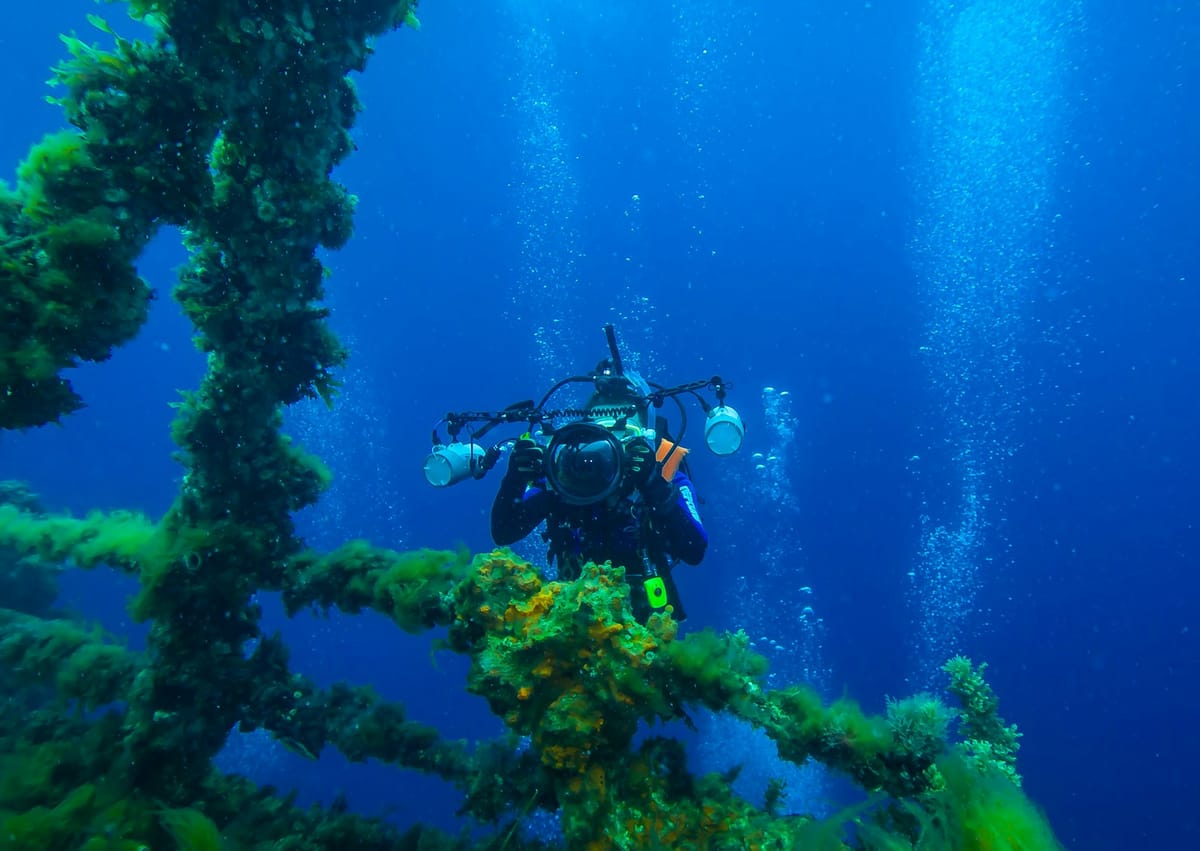 Scuba diver at SS Thistlegorm wreck in Red Sea